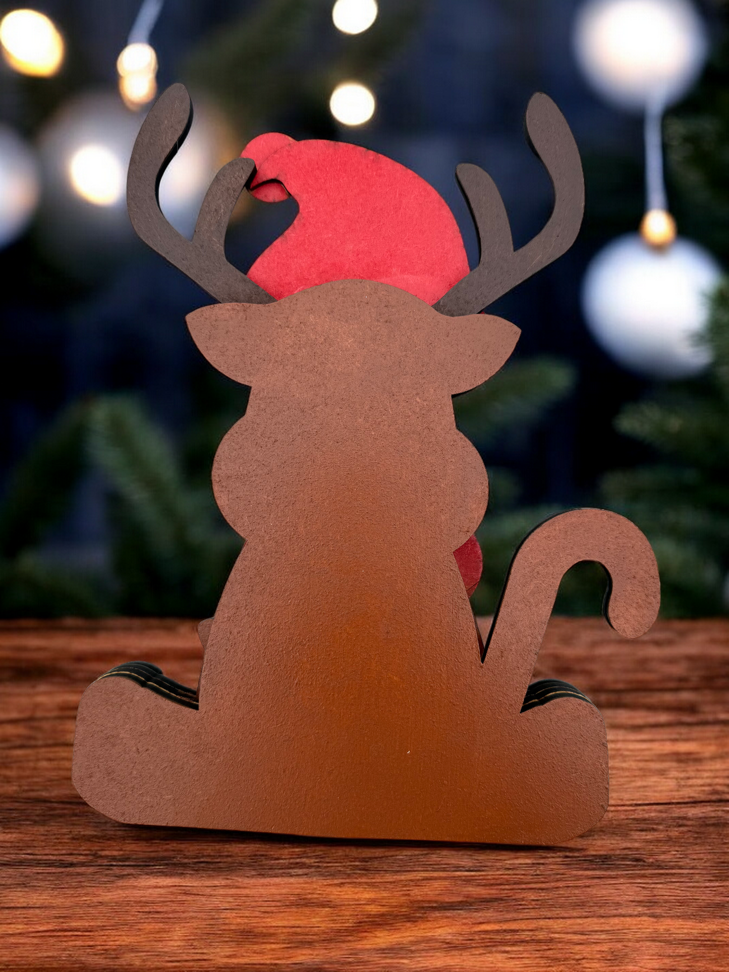 back of reindeer with santa hat